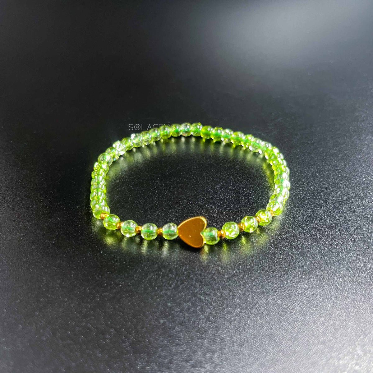 Natural peridot 4mm heart charm bracelet