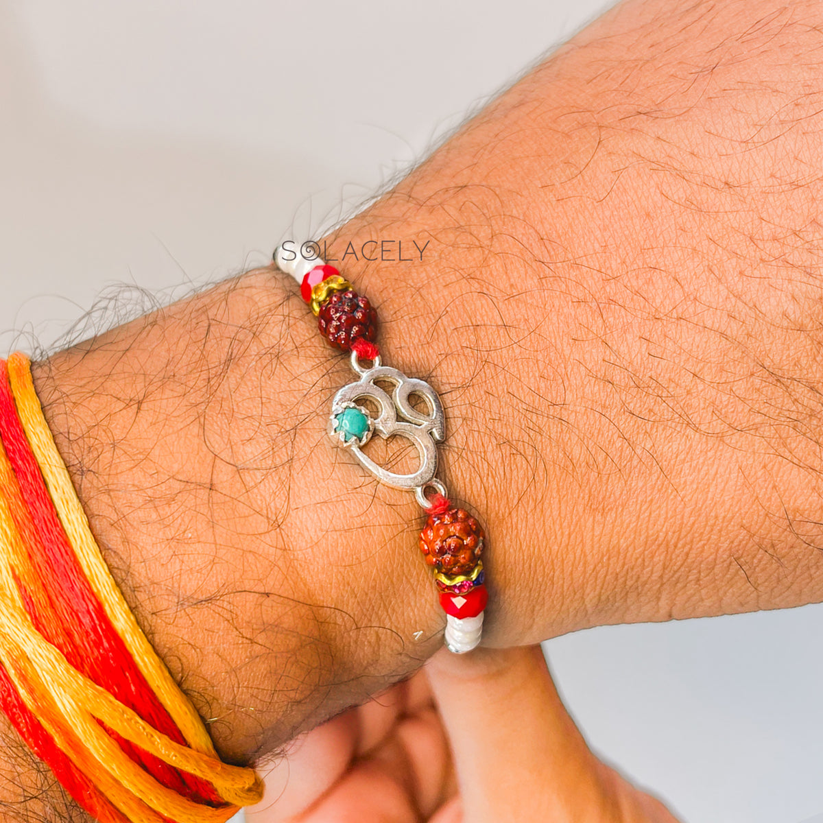 Om crystal rakhi for brother