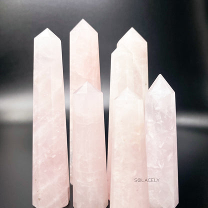 Polished rose quartz crystal wand