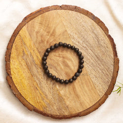 Pyrite Crystal Bracelet on wooden base