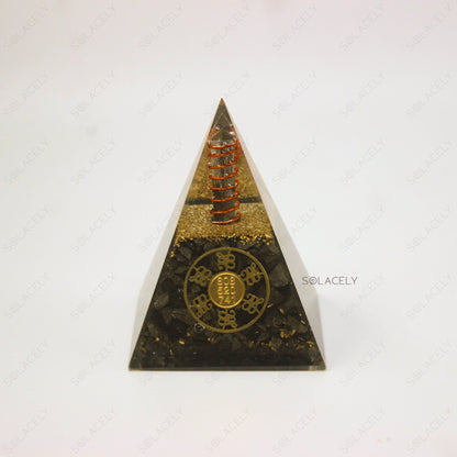 Pyrite Orgone Pyramid on white background