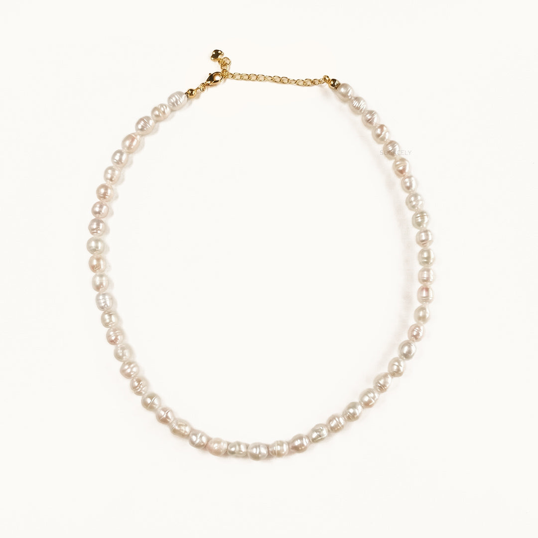 Quiet grace pearl necklace