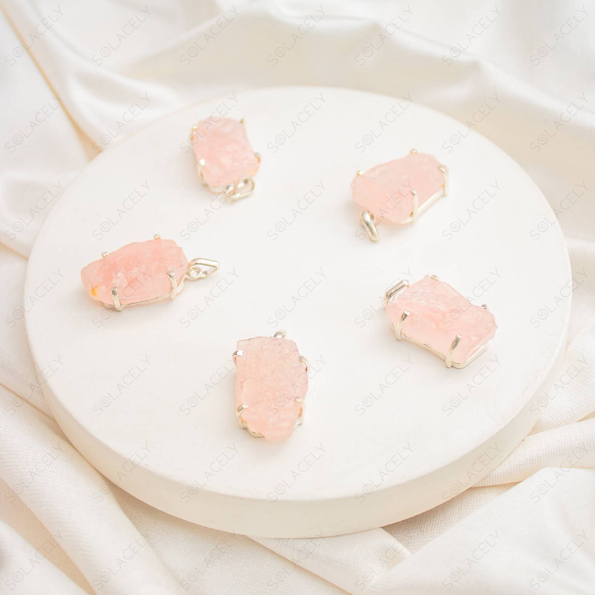 raw rose quartz pendant