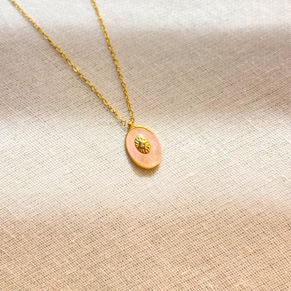 Rose quartz sunburst charm necklace