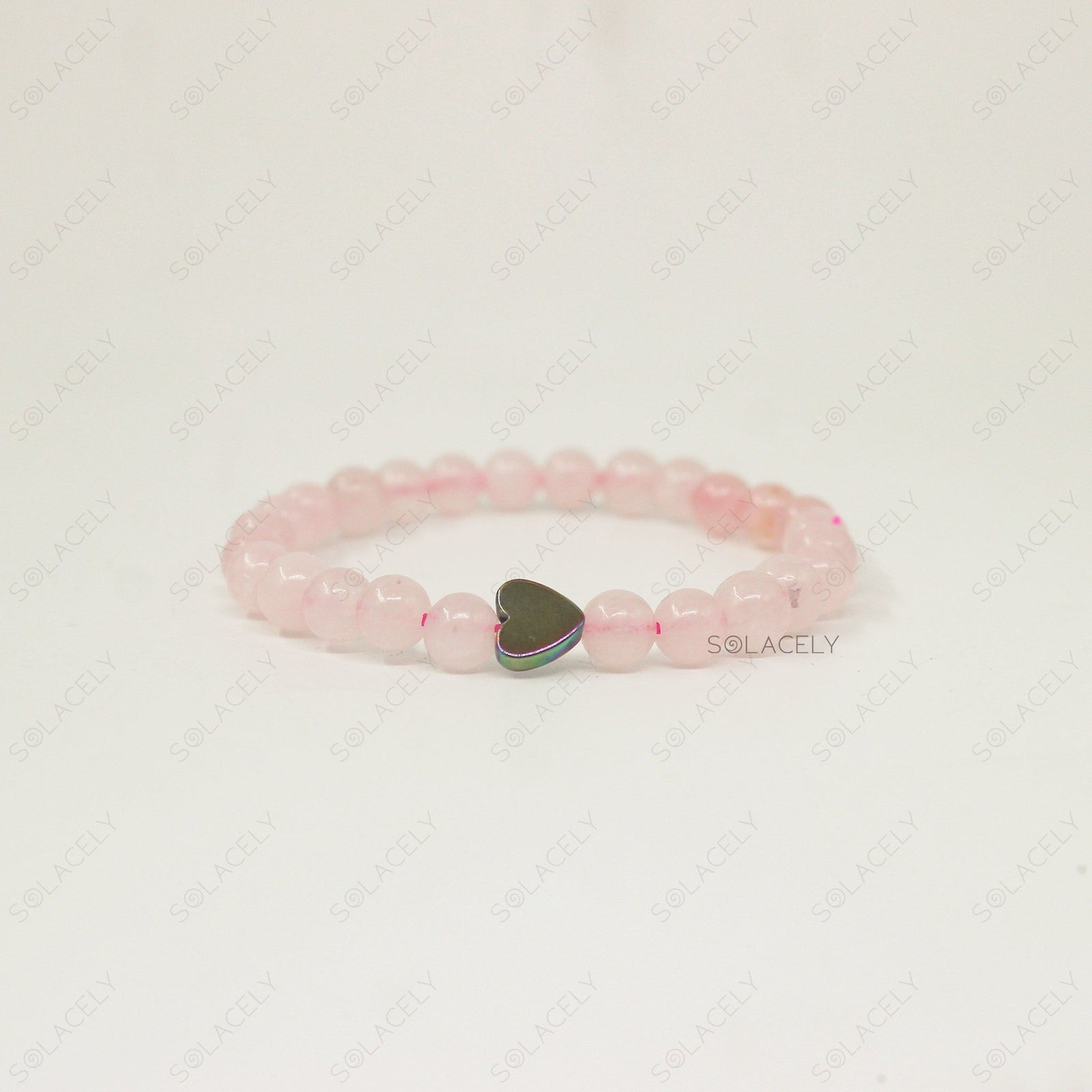 rose quartz with heart charm