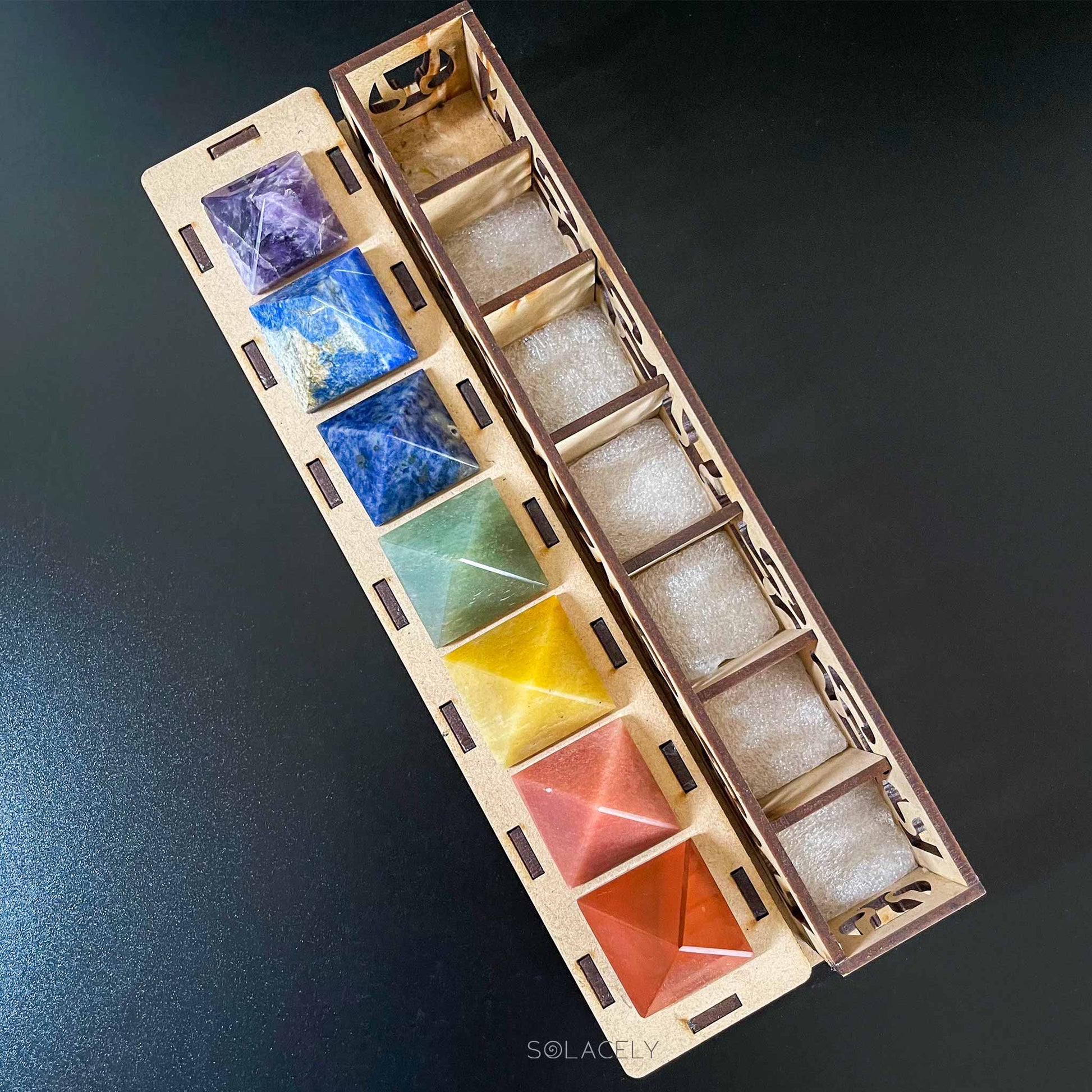 Seven chakra meditation stone pyramids