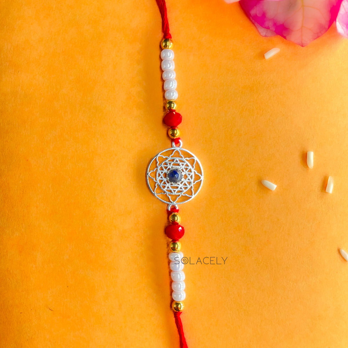 Solacely crystal rakhi with real stone