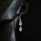 sterling silver celtic rose quartz drop earrings