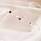 sterling silver faceted red garnet ring