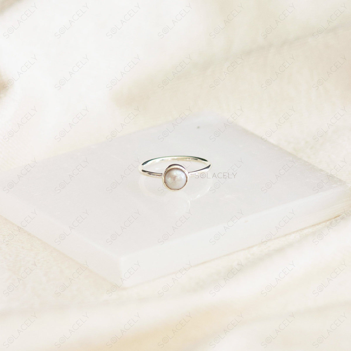 sterling silver ring with lustrous pearl gemstone