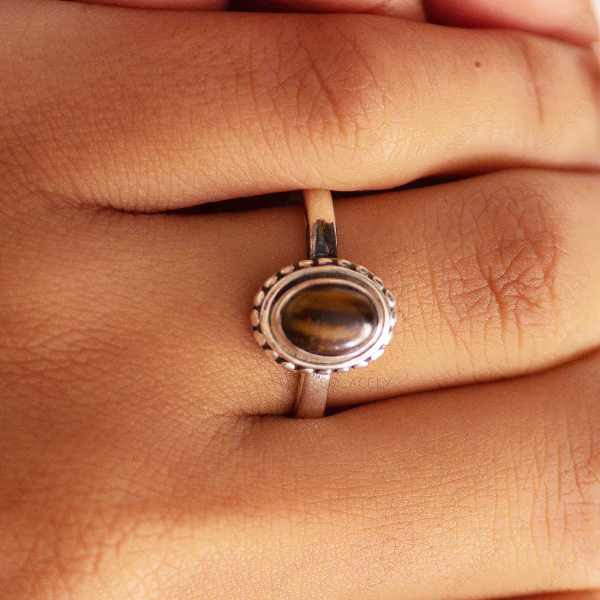 sterling silver ring with tigers eye oval