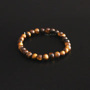 Tiger's Eye Crystal Beads Bracelet on black background