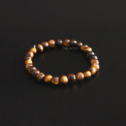Tiger's Eye Crystal Beads Bracelet on black background