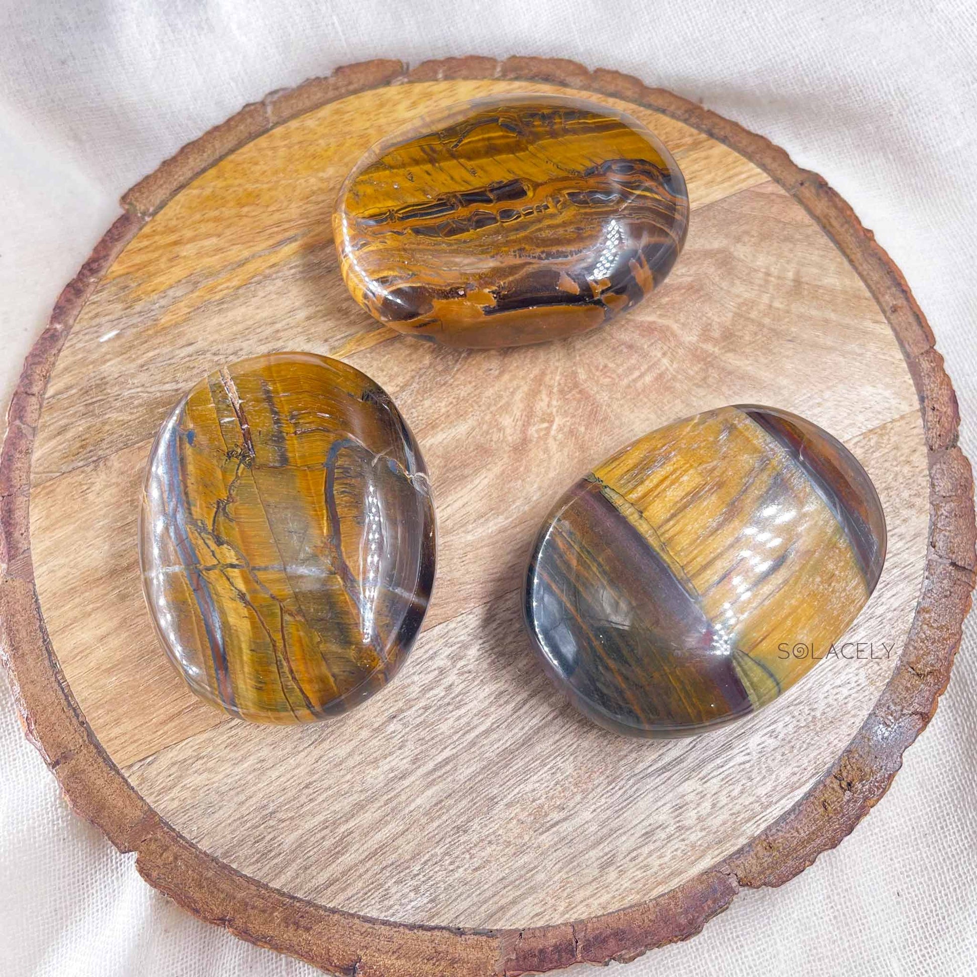 tigers eye palm stone
