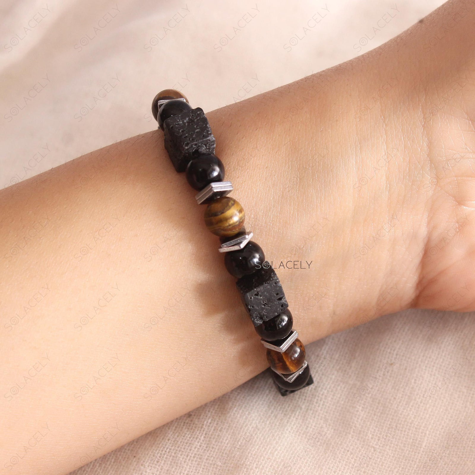 Triple Protection Bracelet with Lava Stone on wrist