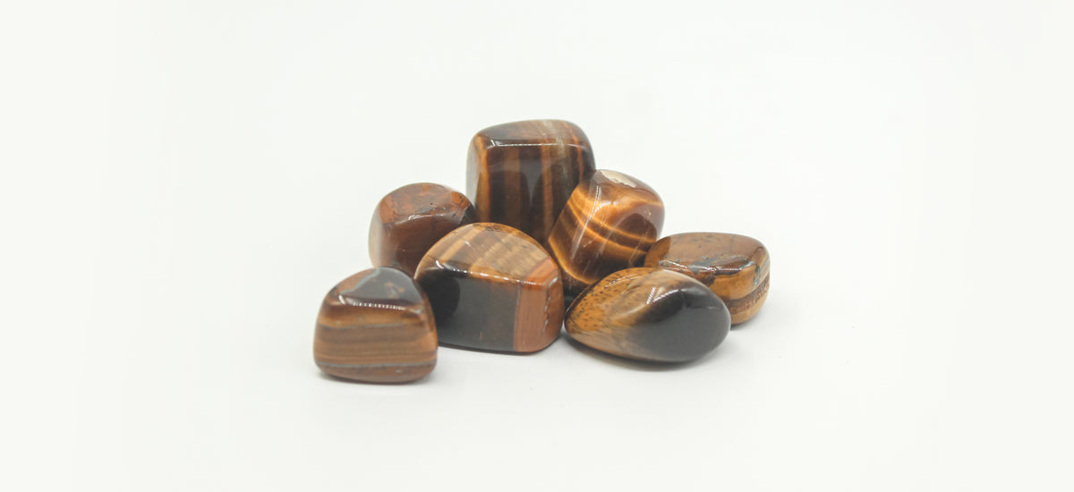 Pile of polished tiger eye tumbled stones