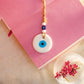 white evil eye wall decor